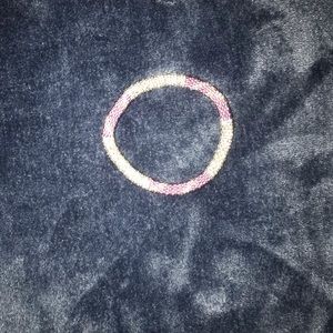 Beaded purple and white bracelet